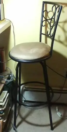 Swivel counter stool gold with black steel backrest. Clean. Like new!