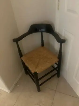 Black roundabout chair or corner chair with rush seat