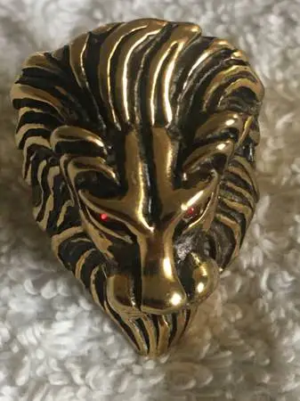 Lion ring mens size 10 goldtone with red eyes