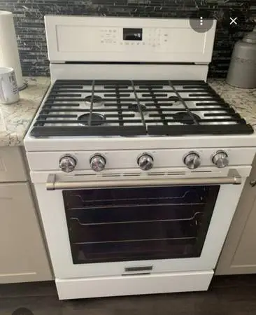 KitchenAid gas stove. Retail $1600. Delivery available