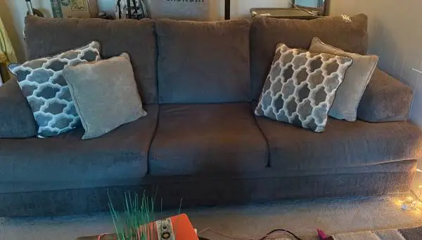 Dark tan couch with pillows OBO