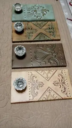 TIN EMBOSSED WALL DECOR 4 PLAQUES