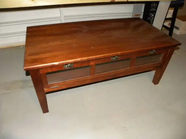 Modern all wood cocktail with front opening glass door protecting stor