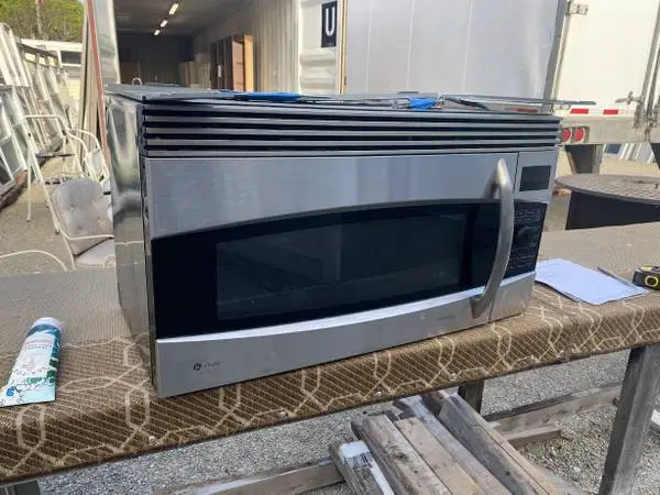 SS GE Profile Microwave Oven 1.7 Cu Ft Model #JVM1790SK01 Used