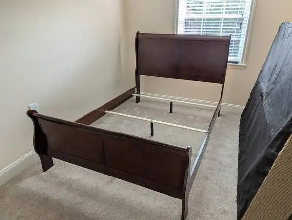Wooden sleigh bed frame, full/double, like new