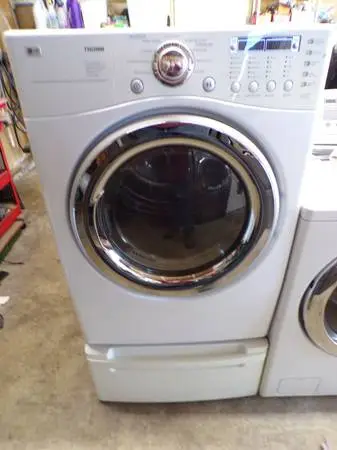single LG Dryer w/ pedestal