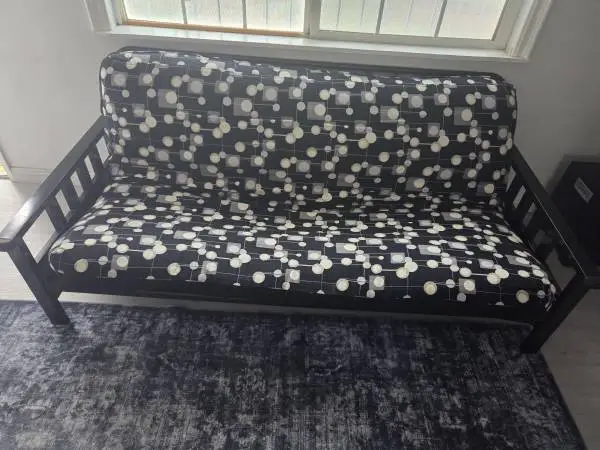 Metal futon frame and extra thick mattress