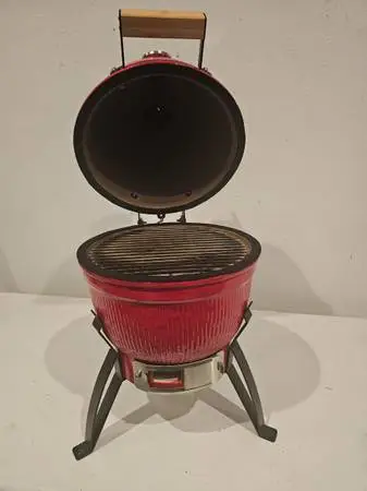 Kamado style ceramic grill and stand