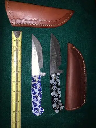 Damascus knives w/ Skull handles