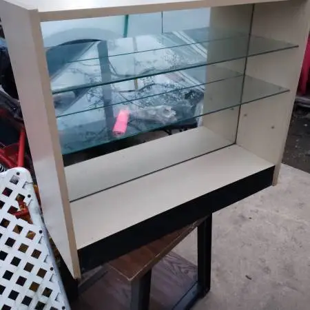 Bookshelf, mirrored backing with adjustable glass shelves, $15