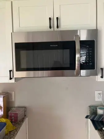 Stainless steel Frigidaire built-in microwave