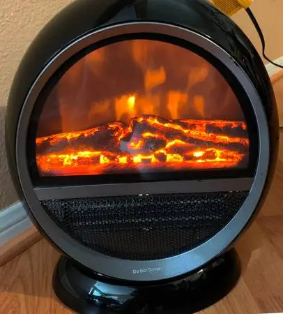 Portable Desk top heater or stove, swing in oval shape