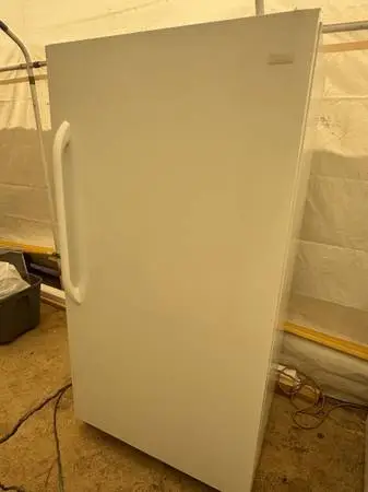 Frigidaire - ( upright freezer/not frost free ) 17 ft.³ $275 ( firm )