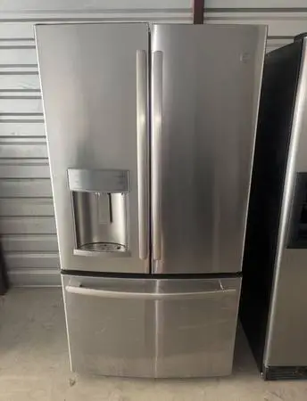 GE Stainless Steel Refrigerator And Freezer