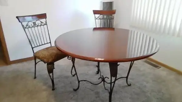 have dark wood table 48  2 chairs