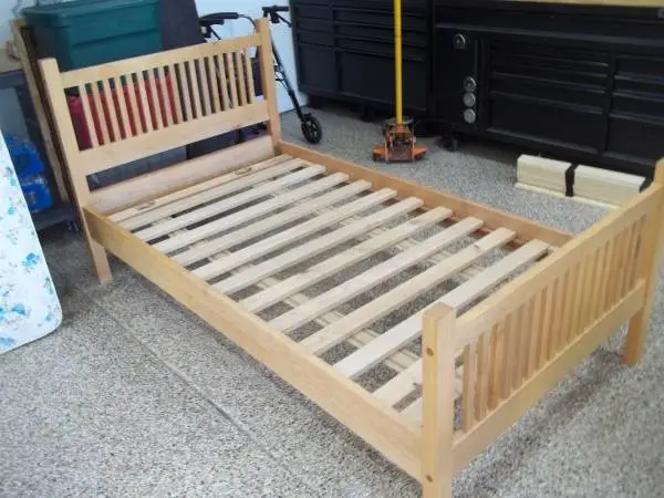 Nice wooden twin bed and like new mattress