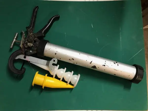 Sausage style caulk gun
