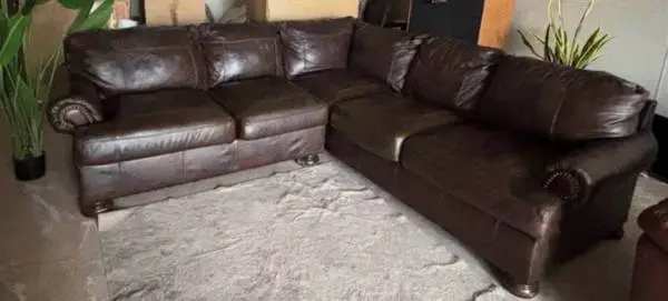 DARK BROWN GENUINE LEATHER SECTIONAL BY ASHLEY FURNITURE, DELIVERY INCLUDED