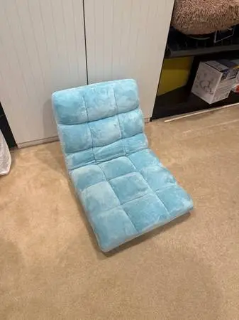 Adjustable floor seat with back