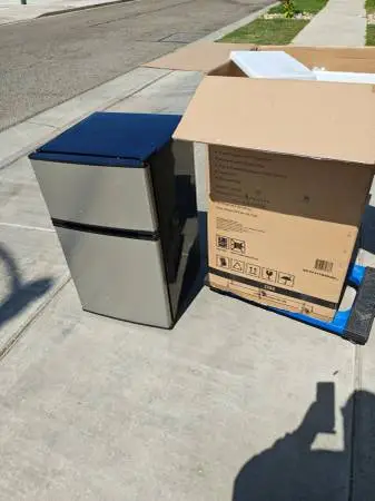 3.1 mini fridge 2 door stainless 150 firm No Less brand new see pictur