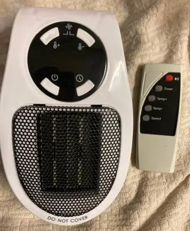 Ceramic heater wall plug with remote