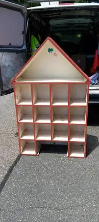 Cool bookcase with roof peak!