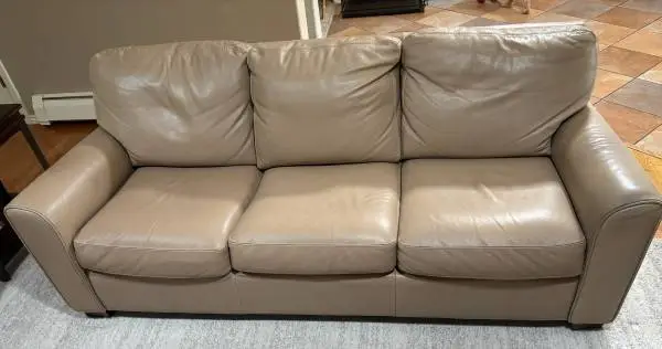 Leather couch, love seat and ottoman