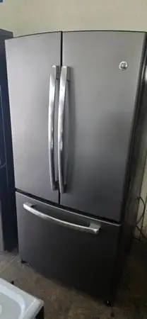 G.E CLEAN STEEL FRENCH DOORS REFRIGERATOR 3 MONTHS WARRANTY N DELIVERY