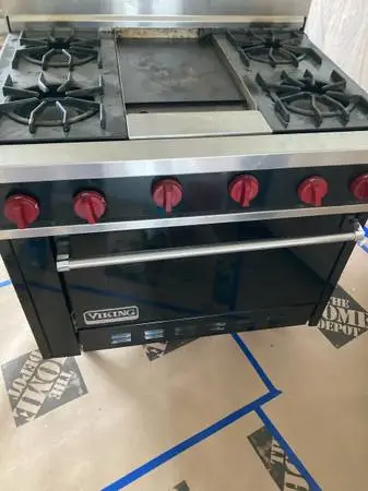 Viking commercial gas stove with griddle