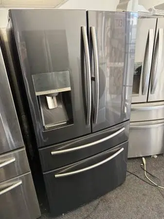 Family size Black stainless steel refrigerator and freezer