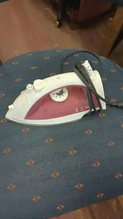Electric steam iron has been tested works great in very good condition