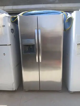 7 year old 25 cu ft stainless steel refrigerator