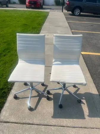 2-Cream Colored Ribbed Office Chairs