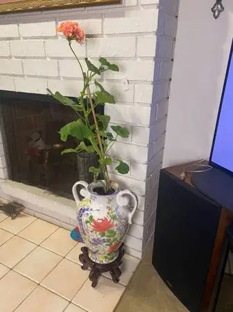 Exquisite Handpainted Ceramic Vase Sits on Dedicated Stand