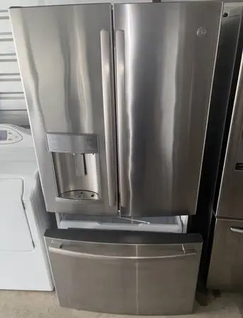 GE Stainless Steel Refrigerator And Freezer