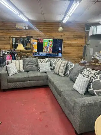 Large Grey L-Shaped Sectional Sofa with Matching Throw Pillows