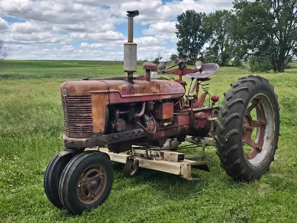 Farmall H tractor with Woods belly mower