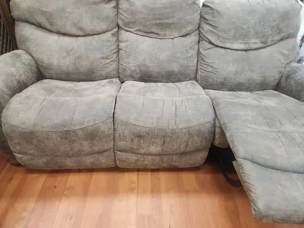 Beautiful brown couch reclines both ends free delivery