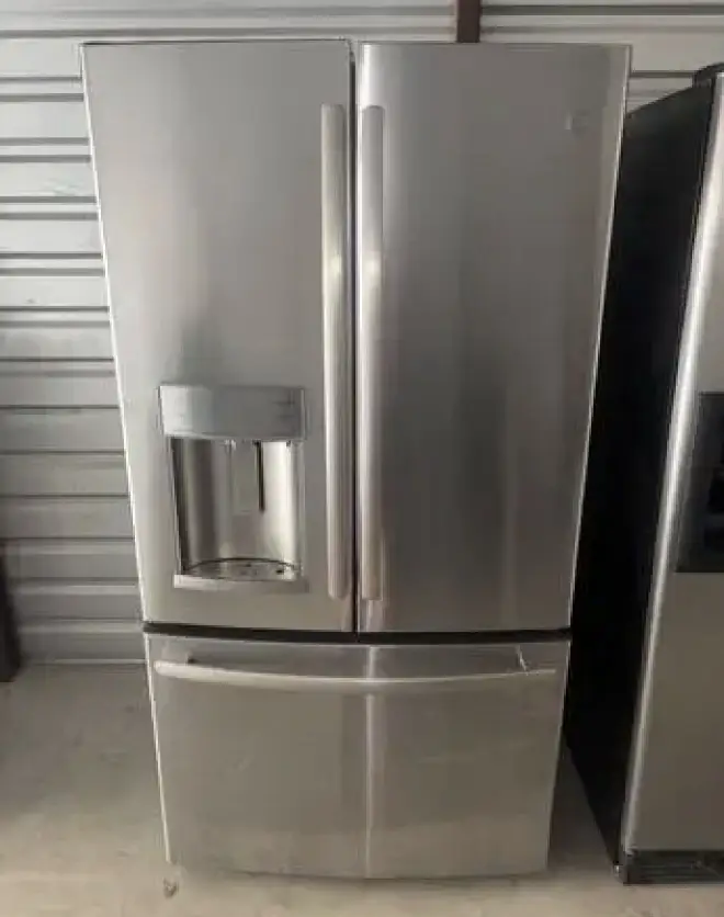 GE Stainless Steel Refrigerator And Freezer
