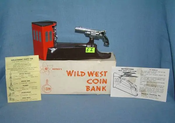Vintage hand painted cast metal Wild West coin bank 1950s with box