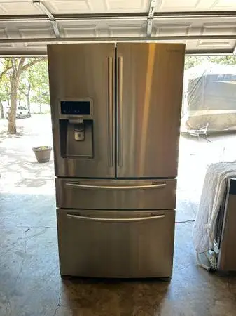 Stainless Samsung refrigerator and stainless maytag dishwasher