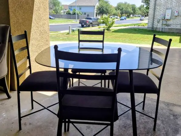 Glass table with 4 chairs
