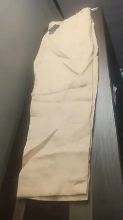 Steve Harvey tan pants