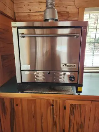 Peerless 4 Stone Pizza oven, LP, cabinet can be included.