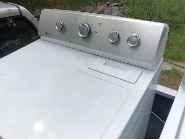 AN ELECTRIC MAYTAG DRYER