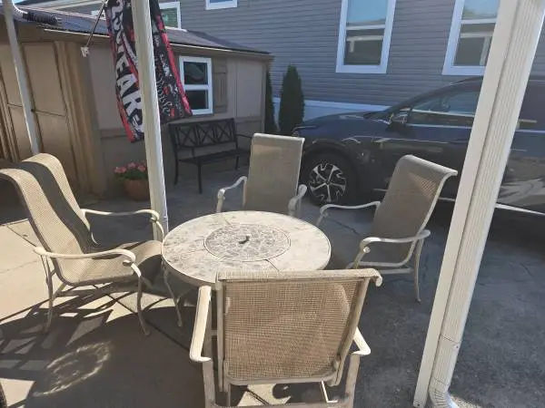 PATIO TABLE WITH FIRE PIT & 4- CHAIRS