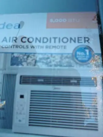 Small window AC with remote new in box