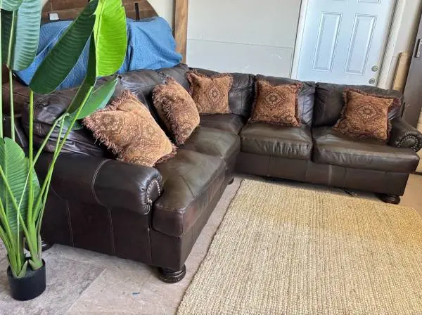 DARK BROWN GENUINE LEATHER SECTIONAL BY ASHLEY FURNITURE, DELIVERY INCLUDED