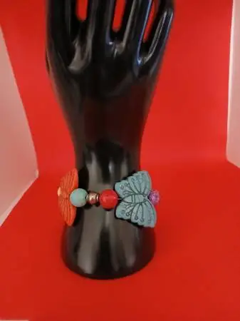 Colorful handmade beaded bracelet with butterfly charms