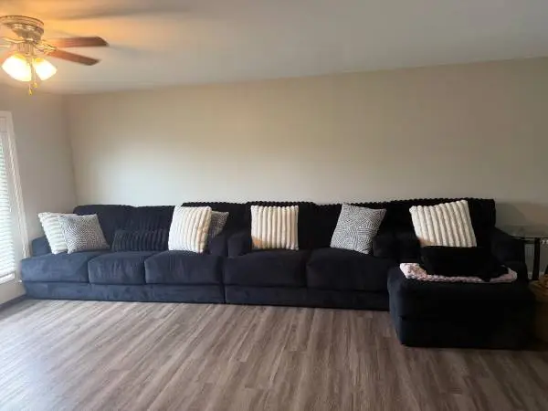 Large Black Modular Sectional Couch with Ottoman – Excellent Condition